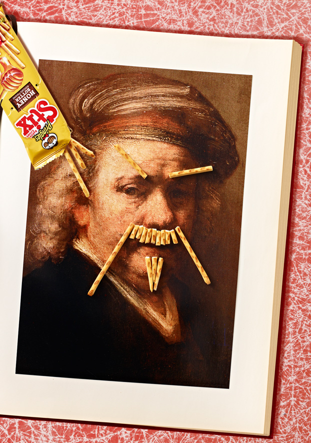 A Pringle held up as a mustache — You Don't Just Eat 'Em campaign